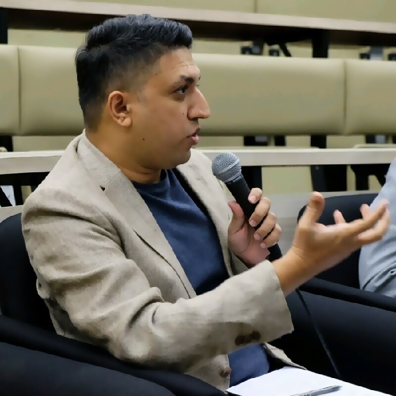 Hamdan Akram, on a panel discussion