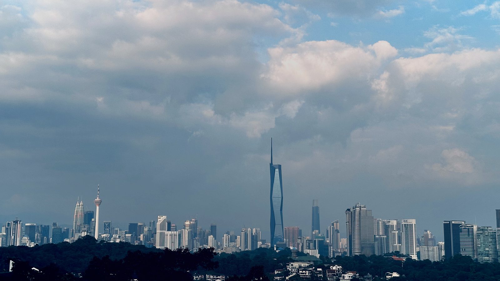 Merdeka 118 against monsoon clouds